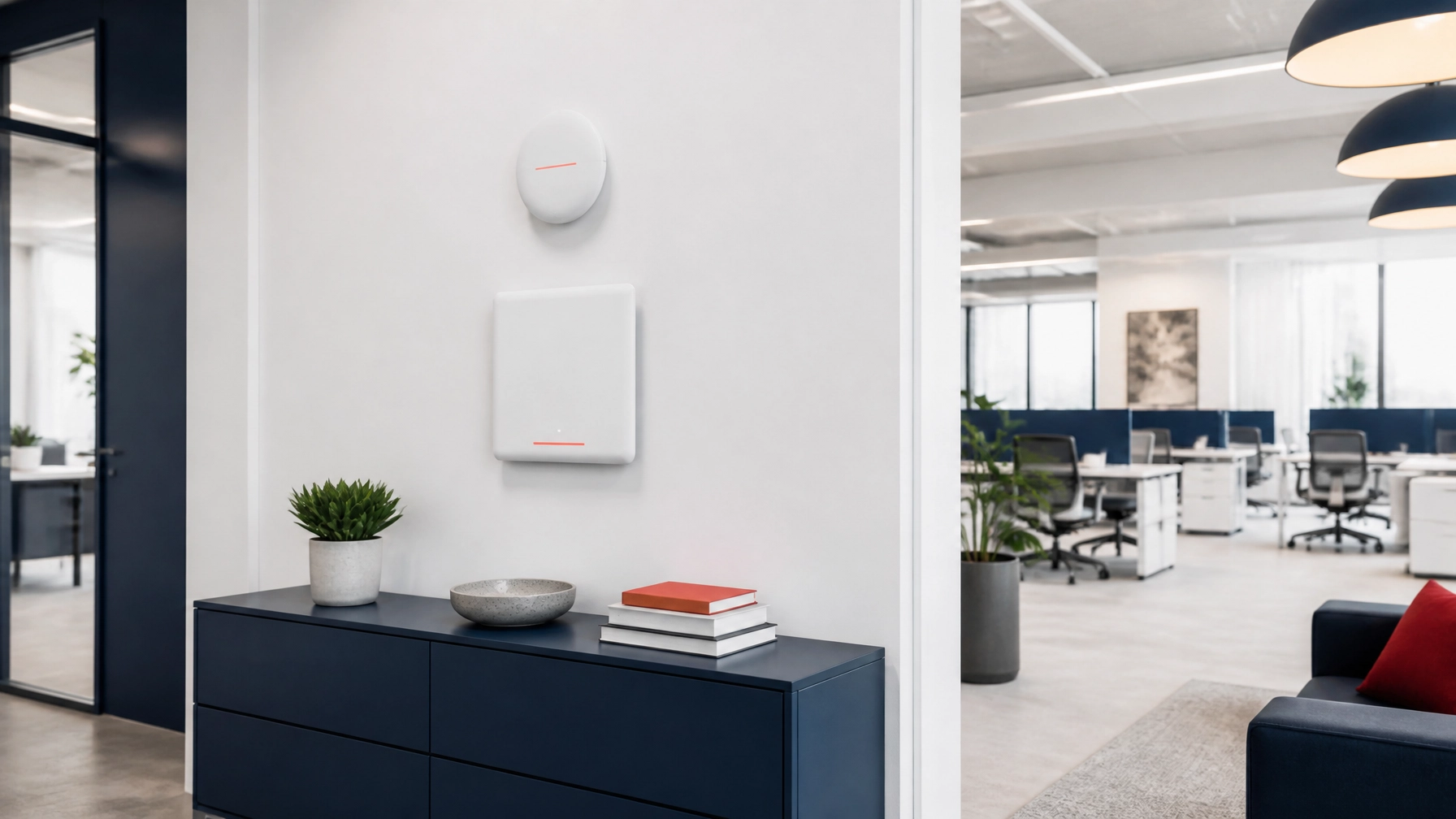Minimalist commercial-grade network hardware installed neatly in a bright office, showing clean infrastructure without visible cable clutter or technical distraction.