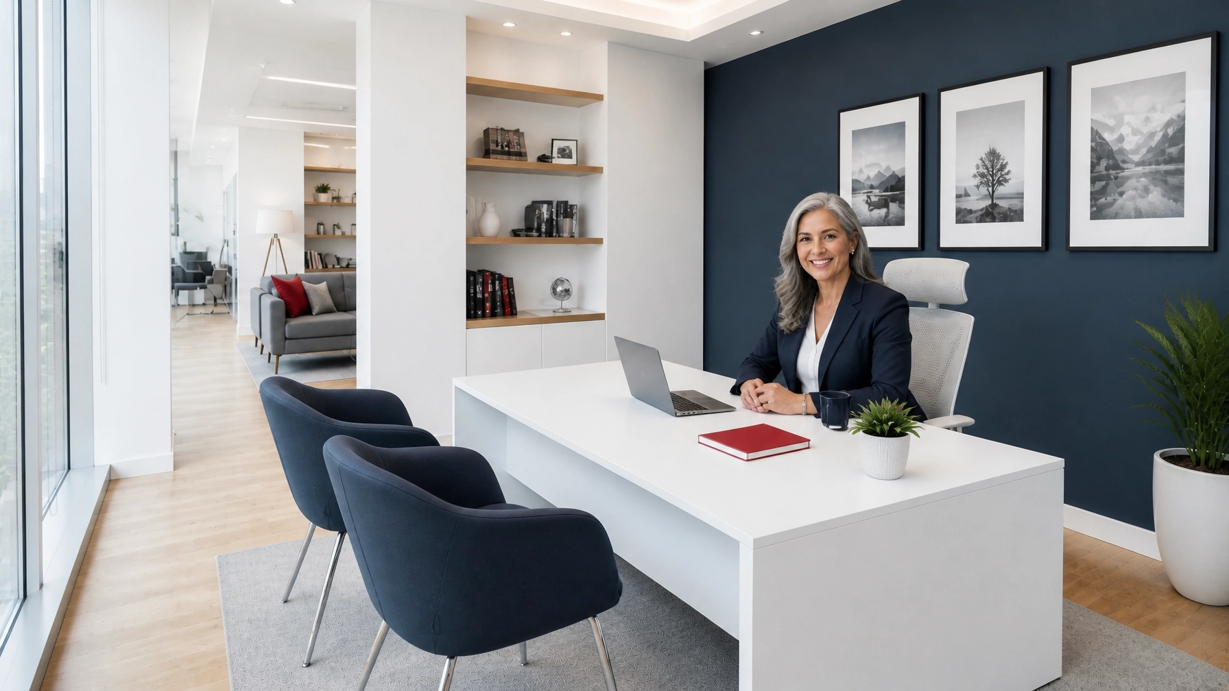 Bright private insurance agent office with a distinct agent representation, showcasing diversity in gender, ethnicity, age, and hair color, plus navy and white styling, subtle red decor, and hidden business-grade networking for a calm, productive work environment.
